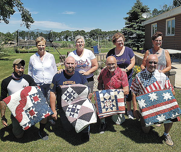 Surprise quilts presented to Lemme family veterans